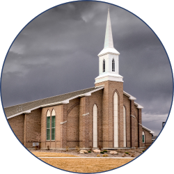 A church standing firm under dark skies—symbolizing the urgency of Biblical Truth in challenging times.